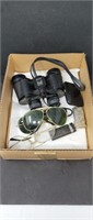 Box of binoculars, pairs of glasses and misc