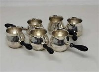 Set of sterling and wood sauce servers