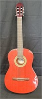 Acoustic guitar with case made in Indonesia