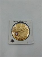 Gold colored Switzerland medal coin
