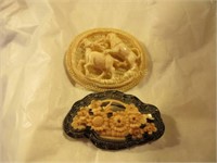 2 brooches