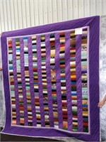 purple patchwork pieced quilt