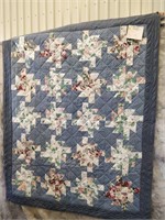 Pinwheel pieced quilt   (blues)
