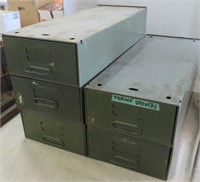 Five green steel storage drawers