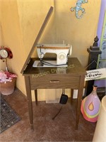 Singer Sewing Machine in Sewing Table