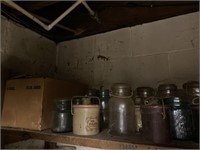 Assorted Jars On Top Shelf