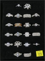 18- Sterling silver rings, sizes 7.5 to 10.5