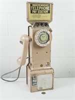 Téléphone de cabine publique payant vintage 1950