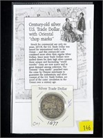 1877 U.S. Trade dollar with chop marks