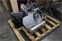Assorted parts and pieces for meat slicers