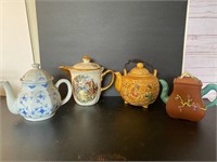 4 teapots