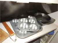 Assorted baking sheets, jars and more