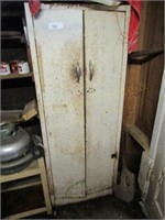 Metal locker with contents