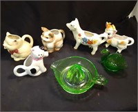 Glass animal pitchers and green juice an swan