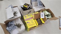 Large lot of staples, screws, nails in boxes