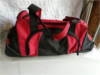 Never used rolling duffel with telescoping handle