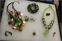 SELECTION OF GREEN COLORING COSTUME JEWELRY