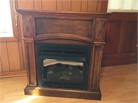 Dual fuel simulated log unvented fireplace