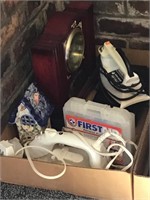 Irons, clock & first aid kit