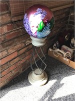 Decorative ball on pedestal