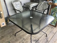 Hampton Bay Glass top patio table w/ 4 chairs and