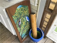 Blue bird painting on glass inside wood cabinet