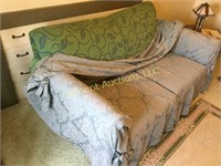 Sleeper love seat with slip cover 63" wide