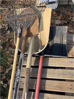 3 shovels and rake