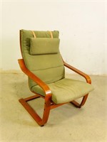 Lounge chair with green cushion