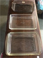 Three Pyrex casserole dishes