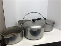 Group of cast aluminum pots