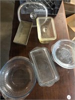 Crate of glass baking dishes and lids