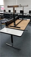 2 adjustable tables
