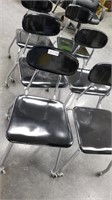 6 black rolling chairs