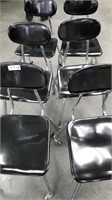 6 black rolling chairs