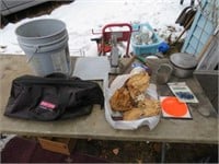 Craftsman bag, bucket of camping items, saw