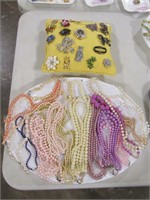 TRAY: COSTUME NECKLACES W/PILLOW OF BROOCHES