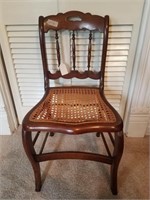 Dining chair with spindle back, damage to seat