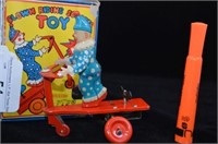 VINTAGE TIN WIND UP TOY - CLOWN RIDING A SCOOTER