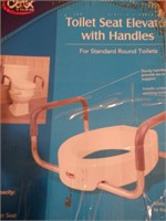 New toilet seat elevator with handles
