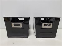 Two black metal storage bins