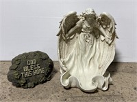 Composite angel statue and God Bless Home stone
