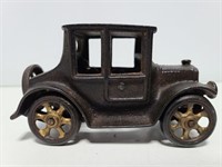 Small cast iron antique car figure