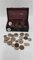 ASSORTED FOREIGN COINS IN ANTIQUE WOOD BANK BOX