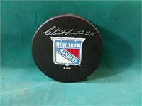 Official NHL puck signed by Clint Smith with COA