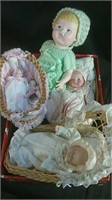 Baby dolls with basket
