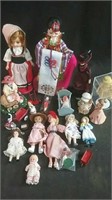 Assorted miniature dolls and figures