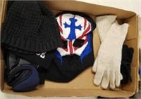 Box of gloves and stocking hats.