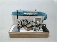 vintage white super deluxe sewing machine