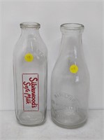 2 vintage milk bottles